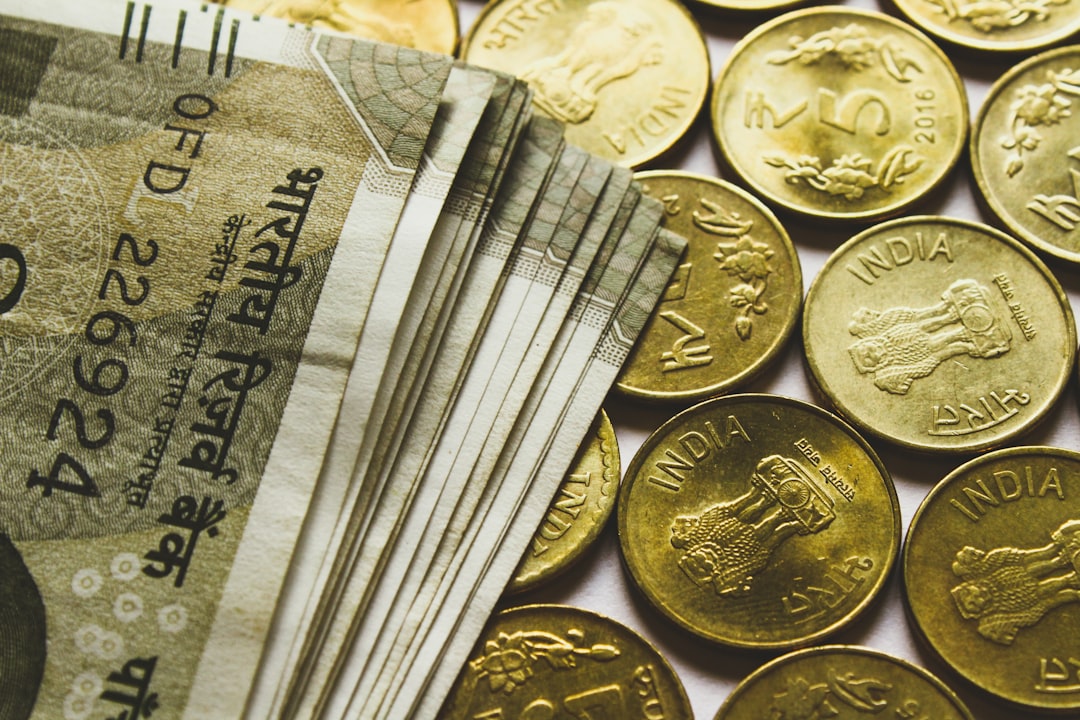 round-gold-colored-rupee-coins-and-banknotes-kzuii7enbws